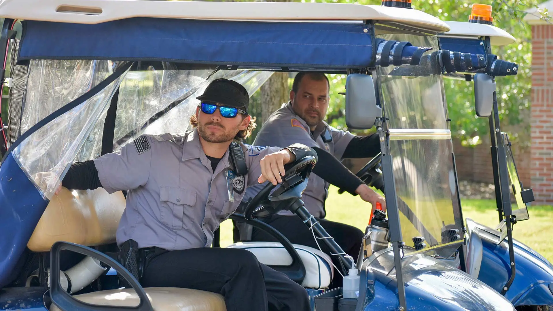 Security guards sitting in a cart in Tampa, FL.