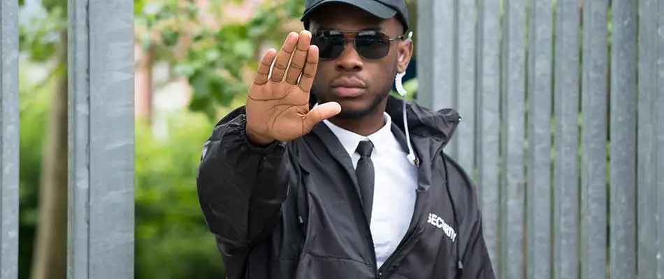 Security guard blocking access to a business park near Brandon, Florida.