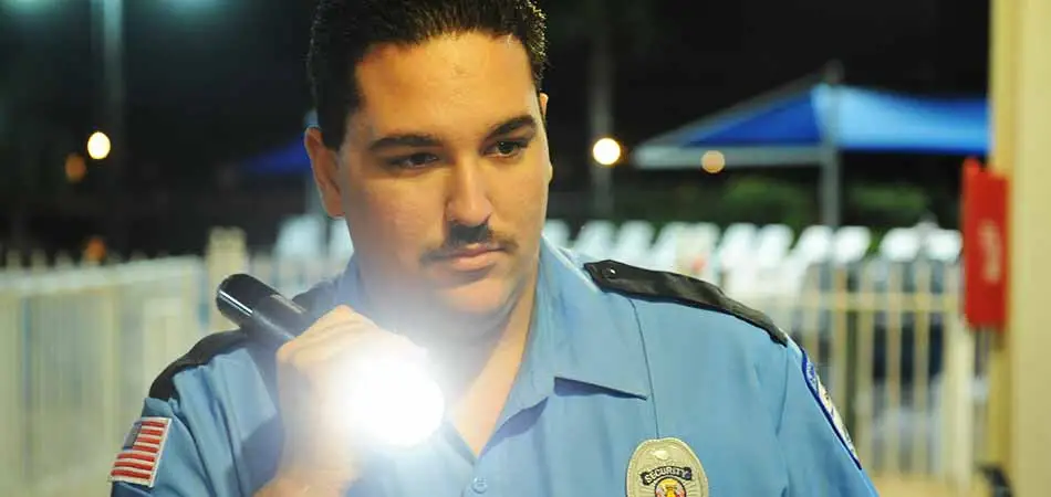 Security officer performing a nigh time patrol at a property located in St. Pete, FL.