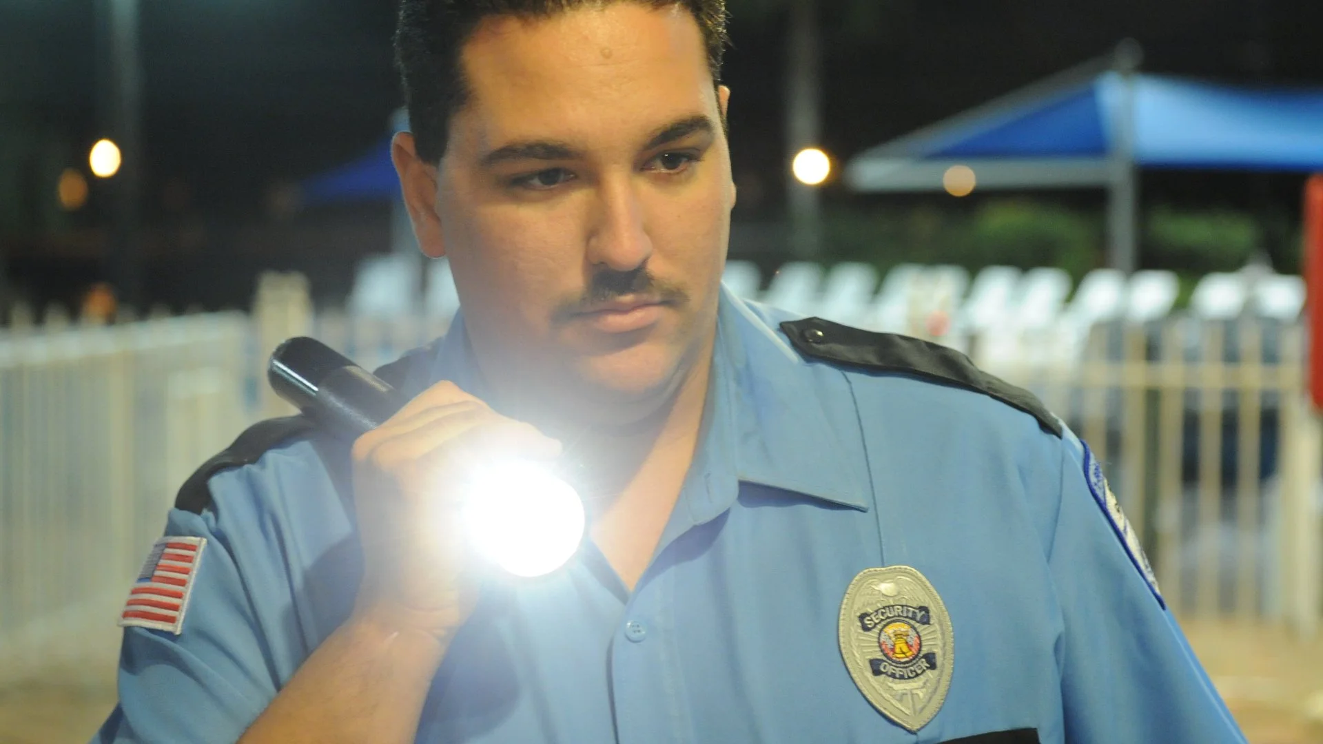 banner-security-guard-holding-flashlight Dunedin, FL Security Services